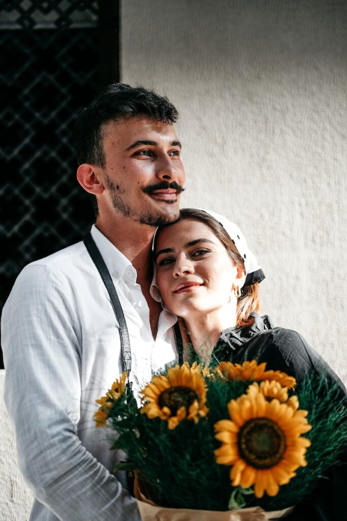 A Couple with Sunflowers